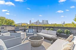 Modern Apt with Rooftop & Skyline Views