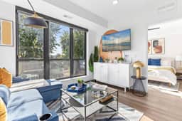 Modern Apt with Rooftop & City Views