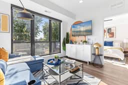 Modern Apt with Rooftop & City Views - Image 3
