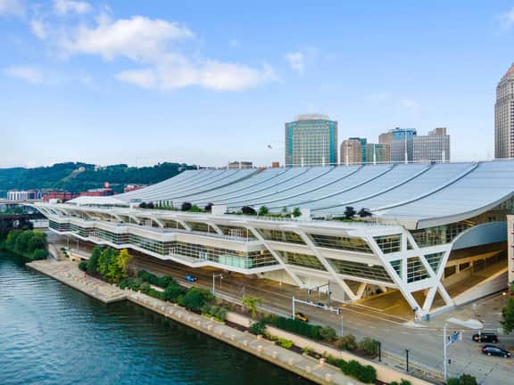 Iconic waterfront city views beside a stunning modern convention center
